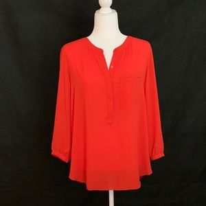 Loose orange blouse